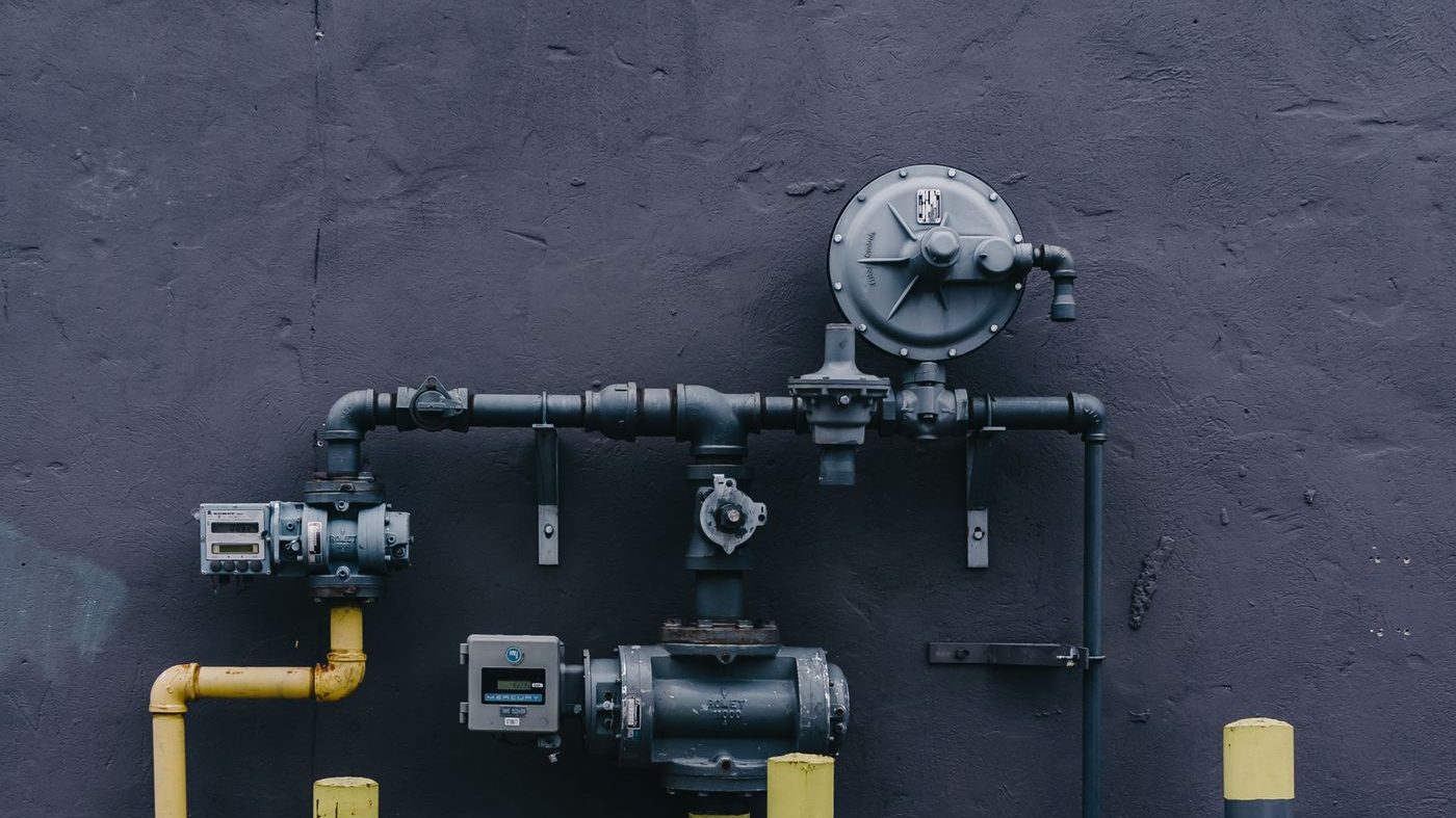 Exterior gas meter with yellow gas piping